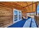 Wooden deck with mountain views and two chairs at 561 Miranda Rd, Pahrump, NV 89060