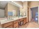 Bathroom with double sinks and view of bedroom at 1052 Hollyhock Dr, Henderson, NV 89011