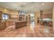 Spacious kitchen with island, granite countertops, and ample wood cabinetry at 1052 Hollyhock Dr, Henderson, NV 89011