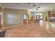 Open living area with tile flooring and views to kitchen at 1052 Hollyhock Dr, Henderson, NV 89011