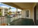 This balcony has a lovely view of lush plants and the community parking area at 3550 Bay Sands Dr # 2044, Laughlin, NV 89029