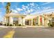 Sunny exterior view of a charming building with a tiled roof and well-maintained landscaping at 3550 Bay Sands Dr # 2044, Laughlin, NV 89029