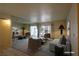 This lovely living room features a sofa, chairs, and a full wall mirror at 3550 Bay Sands Dr # 2044, Laughlin, NV 89029