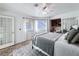 Spacious bedroom with ensuite office nook, mirrored closet, and natural light at 2800 Linkview Dr, Las Vegas, NV 89134