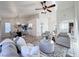 Living room showcases an open layout connecting to the dining area, enhancing the home's spacious feel at 2800 Linkview Dr, Las Vegas, NV 89134