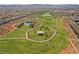 Beautiful aerial view of the community park, surrounded by homes and scenic landscapes at 410 Giocoso Ct, Henderson, NV 89011