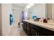 Bathroom featuring a double sink vanity with modern fixtures and a shower-tub combination at 410 Giocoso Ct, Henderson, NV 89011