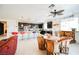 Spacious kitchen with granite countertops, stainless appliances, and colorful bar stools at 410 Giocoso Ct, Henderson, NV 89011