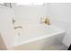 Comfortable soaking tub in a bright main bathroom at 410 Giocoso Ct, Henderson, NV 89011