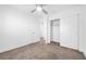 Well-lit bedroom featuring a spacious closet and carpet flooring at 5266 Sherwood Forest Ln, Las Vegas, NV 89122