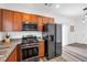 Modern kitchen with stainless steel appliances and granite countertops at 5266 Sherwood Forest Ln, Las Vegas, NV 89122