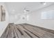 Bright living room with hardwood floors and staircase at 5266 Sherwood Forest Ln, Las Vegas, NV 89122