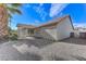 House exterior and backyard with pergola at 673 Kentons Run Ave, Henderson, NV 89052