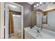 Bathroom with single sink vanity and shower/tub combo at 673 Kentons Run Ave, Henderson, NV 89052