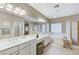 Bathroom with a double vanity, soaking tub and shower at 673 Kentons Run Ave, Henderson, NV 89052