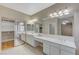 Elegant bathroom with double vanity and soaking tub at 673 Kentons Run Ave, Henderson, NV 89052