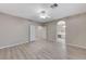 Spacious bedroom with laminate flooring and ceiling fan at 673 Kentons Run Ave, Henderson, NV 89052