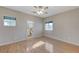 Well-lit bedroom with wood floors and en-suite bathroom at 673 Kentons Run Ave, Henderson, NV 89052