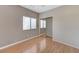 Bedroom with mirrored closet and wood flooring at 673 Kentons Run Ave, Henderson, NV 89052