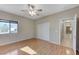 Light and airy bedroom with wood flooring and a window at 673 Kentons Run Ave, Henderson, NV 89052