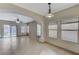 Bright dining area with tile floors and access to the backyard at 673 Kentons Run Ave, Henderson, NV 89052