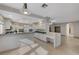 Kitchen features island, white cabinets, and green counters at 673 Kentons Run Ave, Henderson, NV 89052