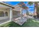 Covered patio with pergola and brick flooring at 673 Kentons Run Ave, Henderson, NV 89052