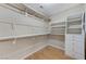 Large walk-in closet with shelving and drawers at 673 Kentons Run Ave, Henderson, NV 89052