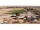 Aerial view showing surrounding farm land, street access, and the overall layout of the property at 2925 Rice St, Logandale, NV 89021