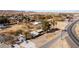 An aerial view highlighting the property's proximity to town and local community at 2925 Rice St, Logandale, NV 89021