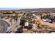 An aerial view featuring the home, desert surroundings and distant mountains at 2925 Rice St, Logandale, NV 89021