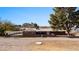 Charming single-story brick home with a metal roof and well-maintained front yard at 2925 Rice St, Logandale, NV 89021