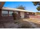 Well-maintained brick home with a walkway to the front door at 2925 Rice St, Logandale, NV 89021