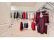 Spacious walk-in closet with ample shelving and hanging space, perfect for organized storage of clothing and accessories at 7804 Island Rail Dr, North Las Vegas, NV 89084