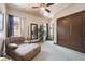 Relaxing bedroom with chaise lounge and large closet at 1004 Crest View Dr, Mesquite, NV 89027
