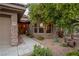 Welcoming front entry with stone accents and landscaping at 1004 Crest View Dr, Mesquite, NV 89027