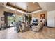 Bright and airy living room with large windows and comfortable seating at 1004 Crest View Dr, Mesquite, NV 89027