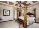 Spacious Primary bedroom with a large four-poster bed and coffered ceiling at 1004 Crest View Dr, Mesquite, NV 89027