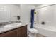 Bathroom featuring a vanity with granite countertop and a combined shower and bathtub at 4490 Rabnor Cir, Las Vegas, NV 89115