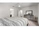 Bedroom with neutral carpet and a gray dresser with a mirror at 4490 Rabnor Cir, Las Vegas, NV 89115
