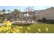 Outdoor picnic area with shaded pergolas perfect for Gathering gatherings with lush, green grass at 4490 Rabnor Cir, Las Vegas, NV 89115