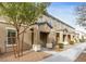 Charming townhomes featuring covered entries and desert landscaping for low maintenance appeal at 4490 Rabnor Cir, Las Vegas, NV 89115