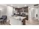 Modern kitchen features granite countertops, stainless steel appliances, and a functional center island at 4490 Rabnor Cir, Las Vegas, NV 89115