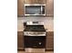 Stainless steel oven, microwave, and granite counters complete this modern kitchen at 4490 Rabnor Cir, Las Vegas, NV 89115