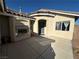 Inviting courtyard featuring an outdoor fireplace and well-maintained patio at 2710 Mustang Pass St, Laughlin, NV 89029