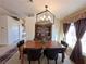 Well-decorated dining room featuring an elegant table set and natural light at 2710 Mustang Pass St, Laughlin, NV 89029