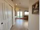 Hallway view of a bright kitchen with an open backyard view at 2710 Mustang Pass St, Laughlin, NV 89029