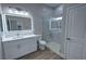 Bathroom with a vanity, toilet, and walk-in shower at 2750 Zephyr Ave, Pahrump, NV 89048