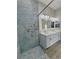 Large walk-in shower with marble tile and built-in seat at 2750 Zephyr Ave, Pahrump, NV 89048