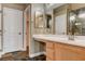 Ensuite bathroom with a vanity, dual mirrors, and walk in shower at 5217 Yellow Dawn Ct, Las Vegas, NV 89130